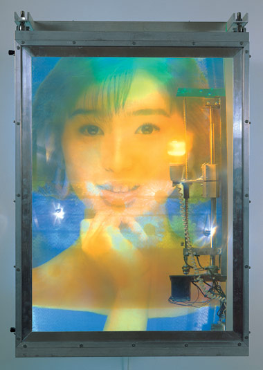 Jon Kessler, Noriko, 1994. Plexiglas, aluminum, screenprint on cloth, duratran, mixed media with lights and motors, 47 x 31 x 26 inches
